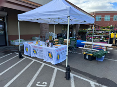Community Outreach Table under Canopy